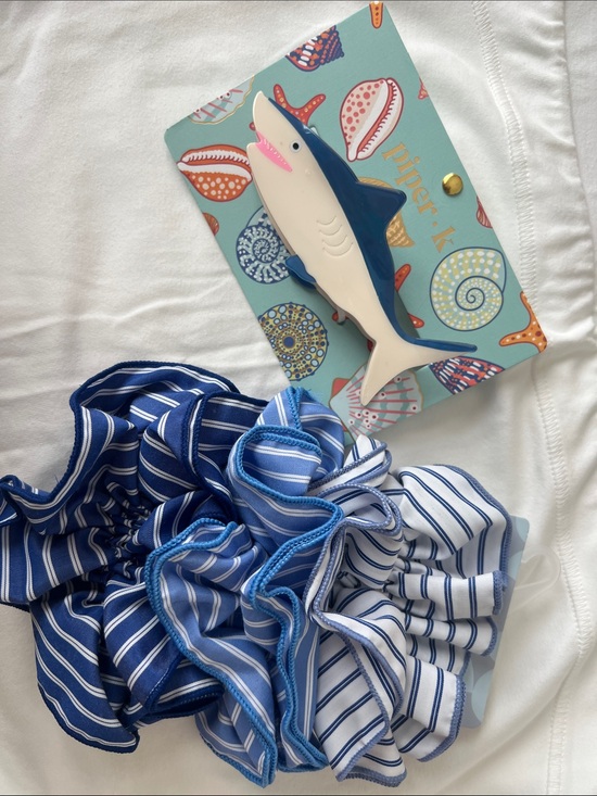 Piper • k shark hair claw and
Piper•k Striped Blue Ruffle Scrunchies - Set of 3 main image 7